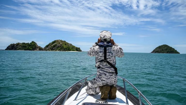 penembakan pekerja migran